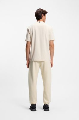 Modern-fit tracksuit bottoms in peached cotton, Natural