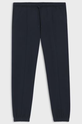 Modern-fit tracksuit bottoms in peached cotton, Dark Blue