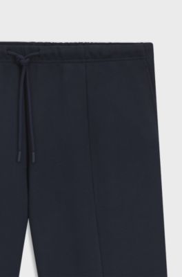 Modern-fit tracksuit bottoms in peached cotton, Dark Blue