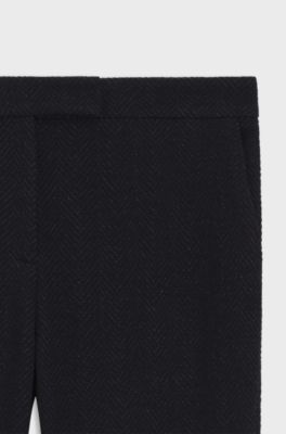 Slim-fit trousers in crease-resistant herringbone stretch jersey, Black