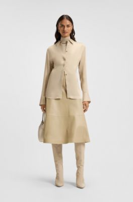 A-formet nederdel i nappal&aelig;der, Lys beige