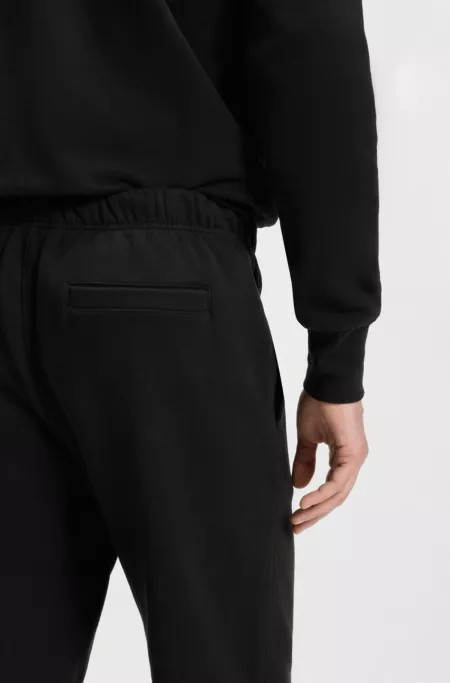 BECKHAM x BOSS relaxed tracksuit bottoms in cotton terry