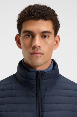 Veste matelass&eacute;e d&eacute;perlante et compressible avec &eacute;tiquette logot&eacute;e, Bleu fonc&eacute;