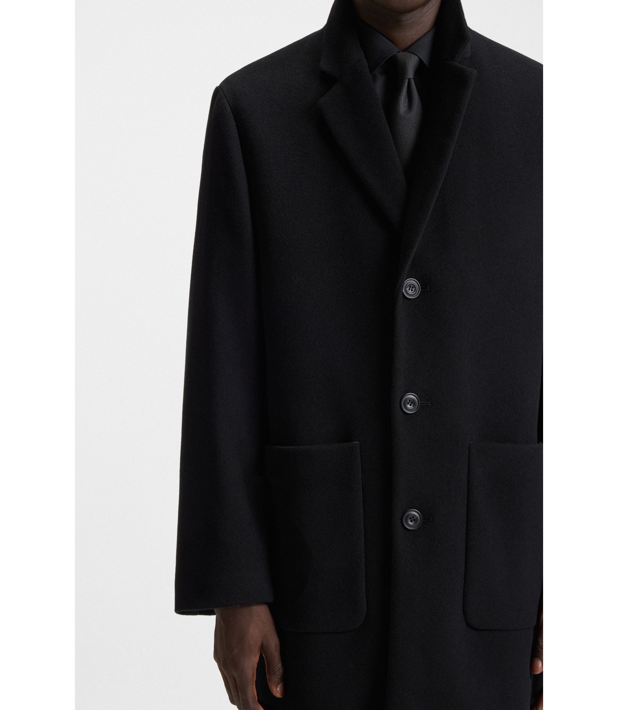 HUGO - Regular-fit coat in a wool blend - Black