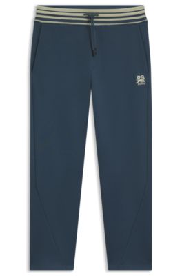 HUGO x RB oversized-fit tracksuit bottoms with striped waistband, Dark Blue