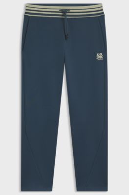 HUGO x RB oversized-fit tracksuit bottoms with striped waistband, Dark Blue