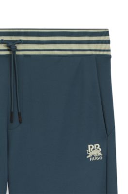 HUGO x RB oversized-fit tracksuit bottoms with striped waistband, Dark Blue