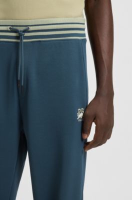 HUGO x RB oversized-fit tracksuit bottoms with striped waistband, Dark Blue