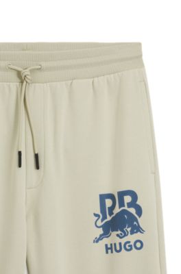HUGO x RB cotton-terry tracksuit bottoms with bull graphic, Light Beige