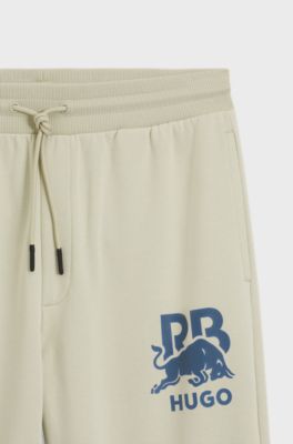 HUGO x RB cotton-terry tracksuit bottoms with bull graphic, Light Beige