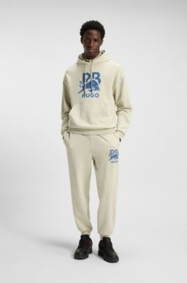 HUGO x RB cotton-terry tracksuit bottoms with bull graphic, Light Beige