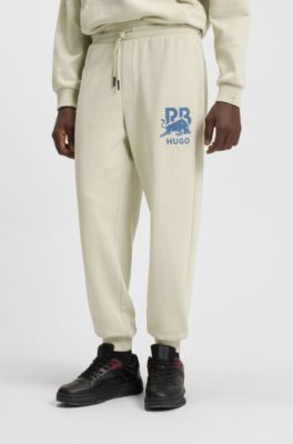 HUGO x RB cotton-terry tracksuit bottoms with bull graphic, Light Beige