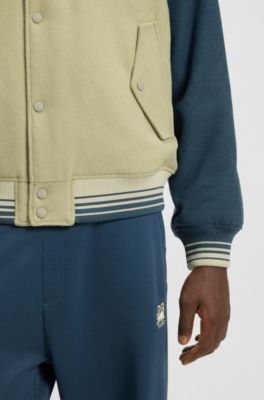 HUGO x RB regular-fit varsity-style jacket with bull graphics, Blue / Beige
