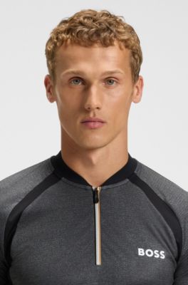 Slim fit pik&eacute;tr&ouml;ja i meshjersey med dragkedja , M&ouml;rkgr&aring;