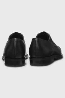 Cap-toe Derby shoes in grained leather, Black