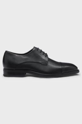 Cap-toe Derby shoes in grained leather, Black