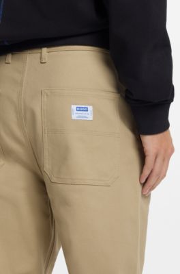Pantaloni baggy fit in tela di cotone elasticizzato, Beige