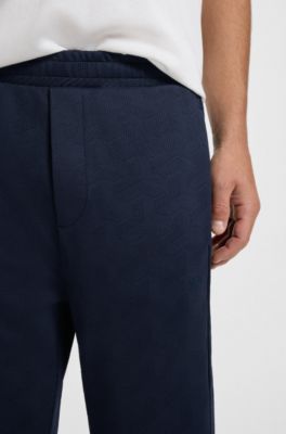 Regular-fit tracksuit bottoms with quilted jacquard, Dark Blue