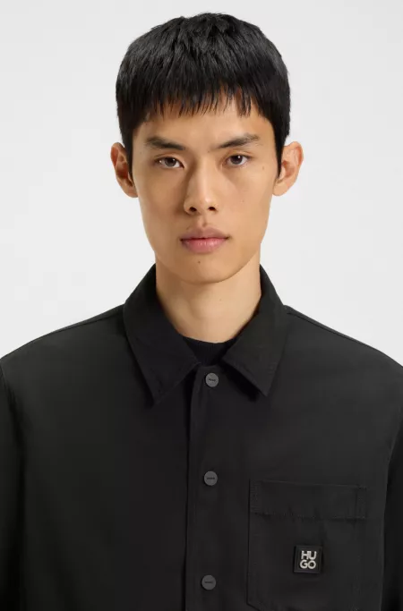 Oversized-fit shirt with stacked-logo badge