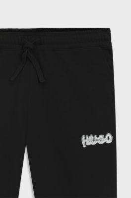 Cotton-terry tracksuit bottoms with logo print, Black