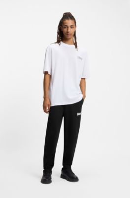 Cotton-terry tracksuit bottoms with logo print, Black