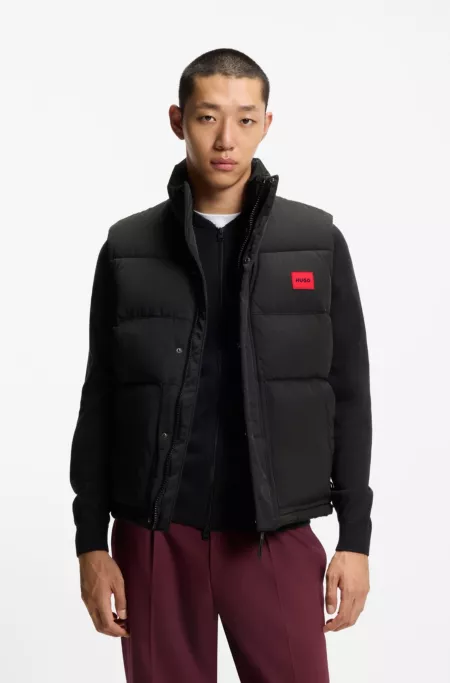 Water-repellent gilet with logo badge