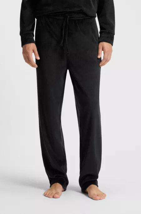 Ribbed-velvet tracksuit bottoms with stacked logo label