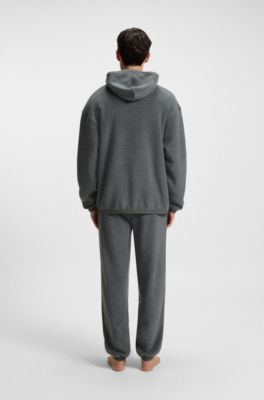 Relaxed-fit fleece tracksuit bottoms with red logo label, Dark Grey