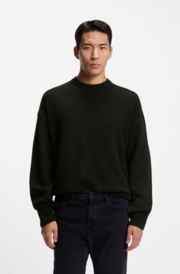 Sweter o&nbsp;swobodnym kroju z&nbsp;wełny dziewiczej, Czarny