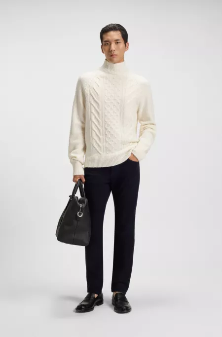 Cable-knit sweater in virgin wool and silk