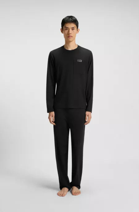 Relaxed-fit pyjamas in stretch jersey with split logos