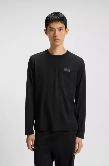 Relaxed-fit pyjamas in stretch jersey with split logos