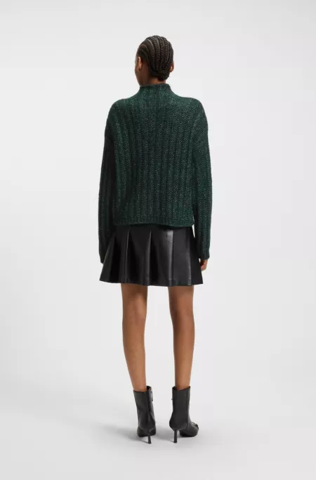 Knitted sweater with ribbed structure