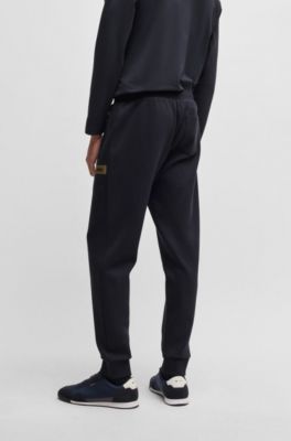 Stretch-cotton tracksuit bottoms with logo detail, Dark Blue