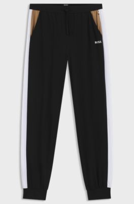 Cotton-blend pyjama bottoms with contrast panels, Black
