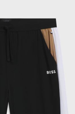 Cotton-blend pyjama bottoms with contrast panels, Black