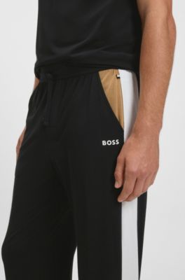 Cotton-blend pyjama bottoms with contrast panels, Black