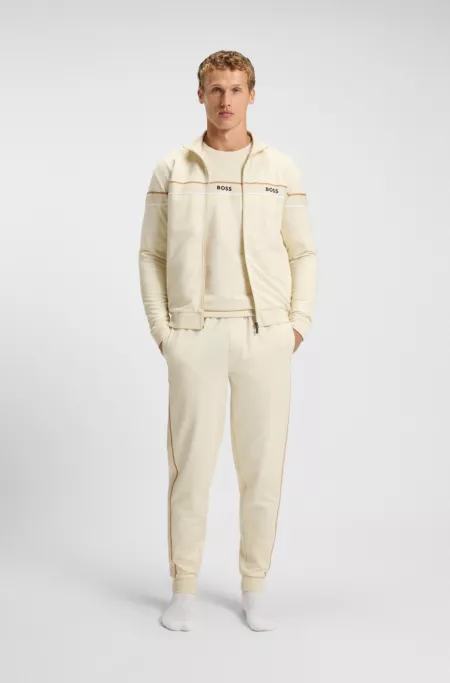 Zip-up jacket in cotton terry with tape trims