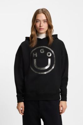 Sudadera de felpa de algod&oacute;n con capucha y logo Happy HUGO brillante, Negro
