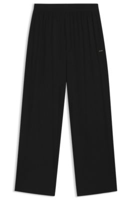 Monogram-print pyjama bottoms with logo plate, Black