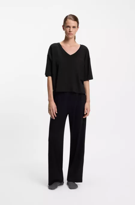 Bas de pyjama à imprimé monogramme avec plaquette logotée