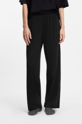 Monogram-print pyjama bottoms with logo plate, Black