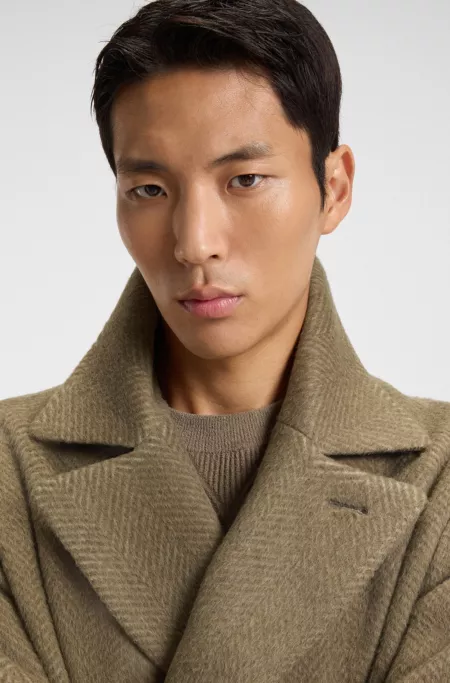 Double-breasted coat in a herringbone alpaca blend