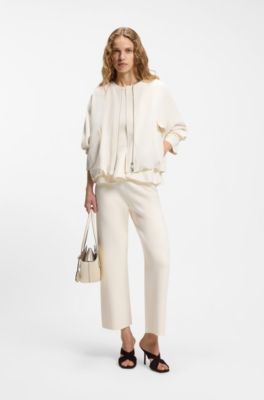 Pantaloni regular fit con pince in maglia, Colore neutro