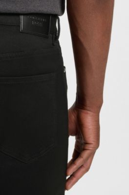 Porsche x BOSS tapered-fit jeans in black stretch denim, Black