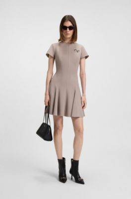 Godet-insert dress with bow brooch, Light Beige