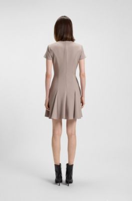 Godet-insert dress with bow brooch, Light Beige