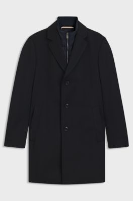 Slim fit vattenavvisande rock med avtagbar innerdel, M&ouml;rkbl&aring;