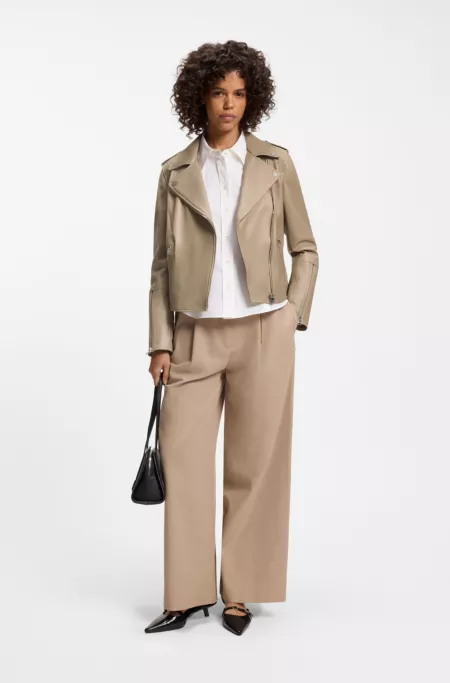 Straight-fit biker jacket in leather with zipped details