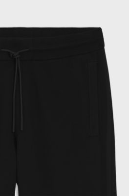 Knitted tracksuit bottoms in a regular fit, Black